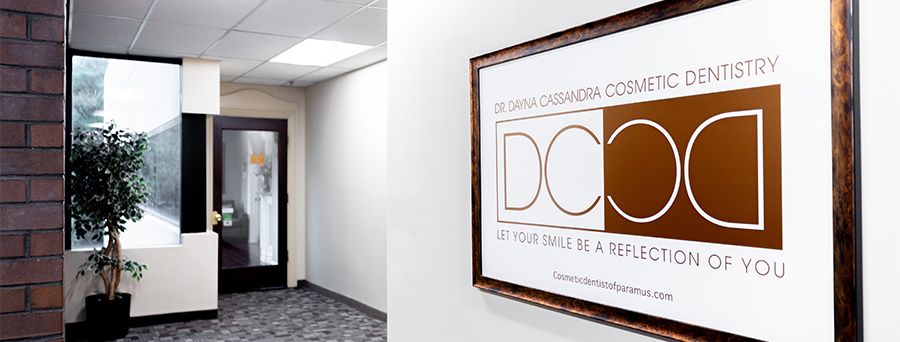Dental office interior with signage and decor.