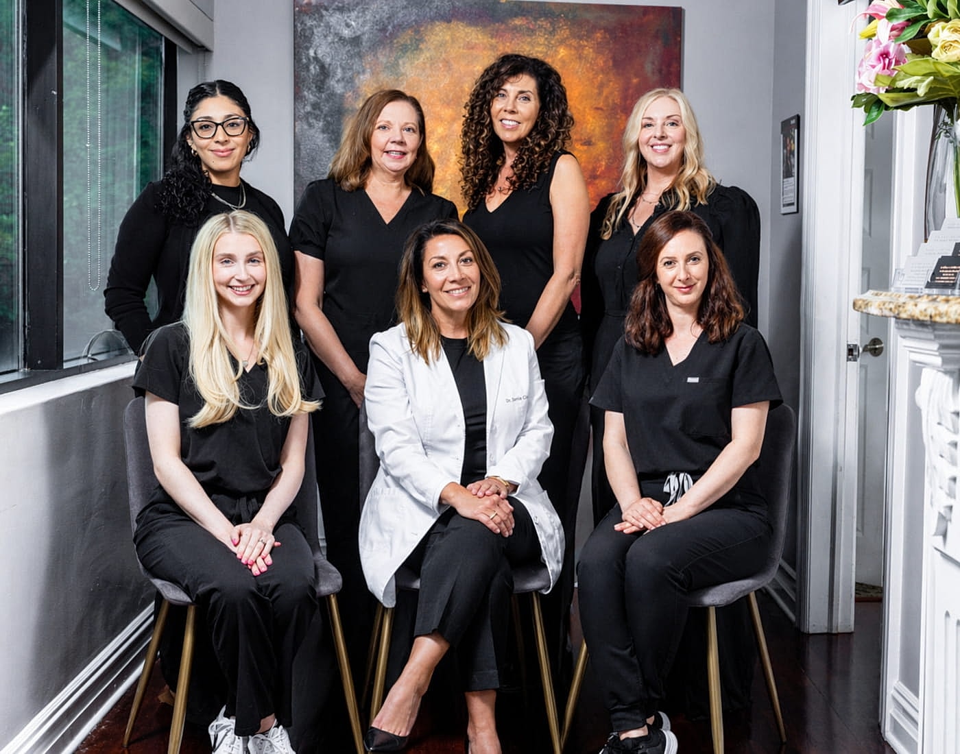 Medical team portrait with smiling professionals.