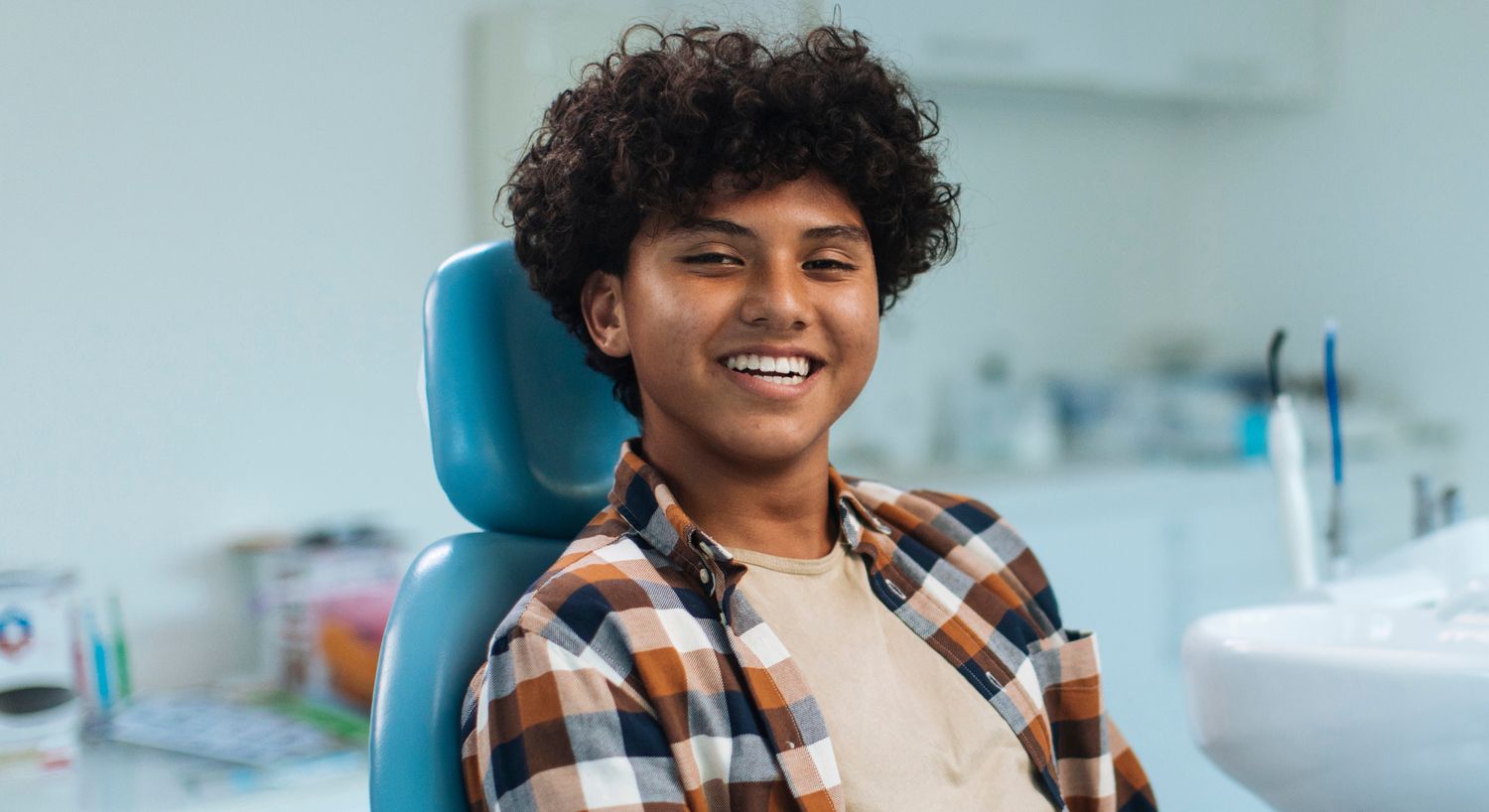 paramus dental implants patient model with dark hair